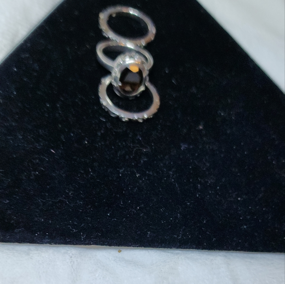 Silpda sterling silver & garnet stackable ring.
